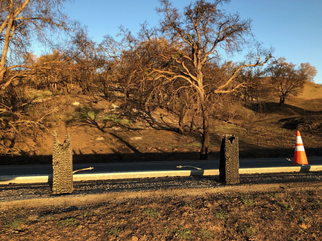This work is licensed under a Creative Commons Attribution-NonCommercial 4.0 International License by Kenley Neufeld Burned Guard Rail